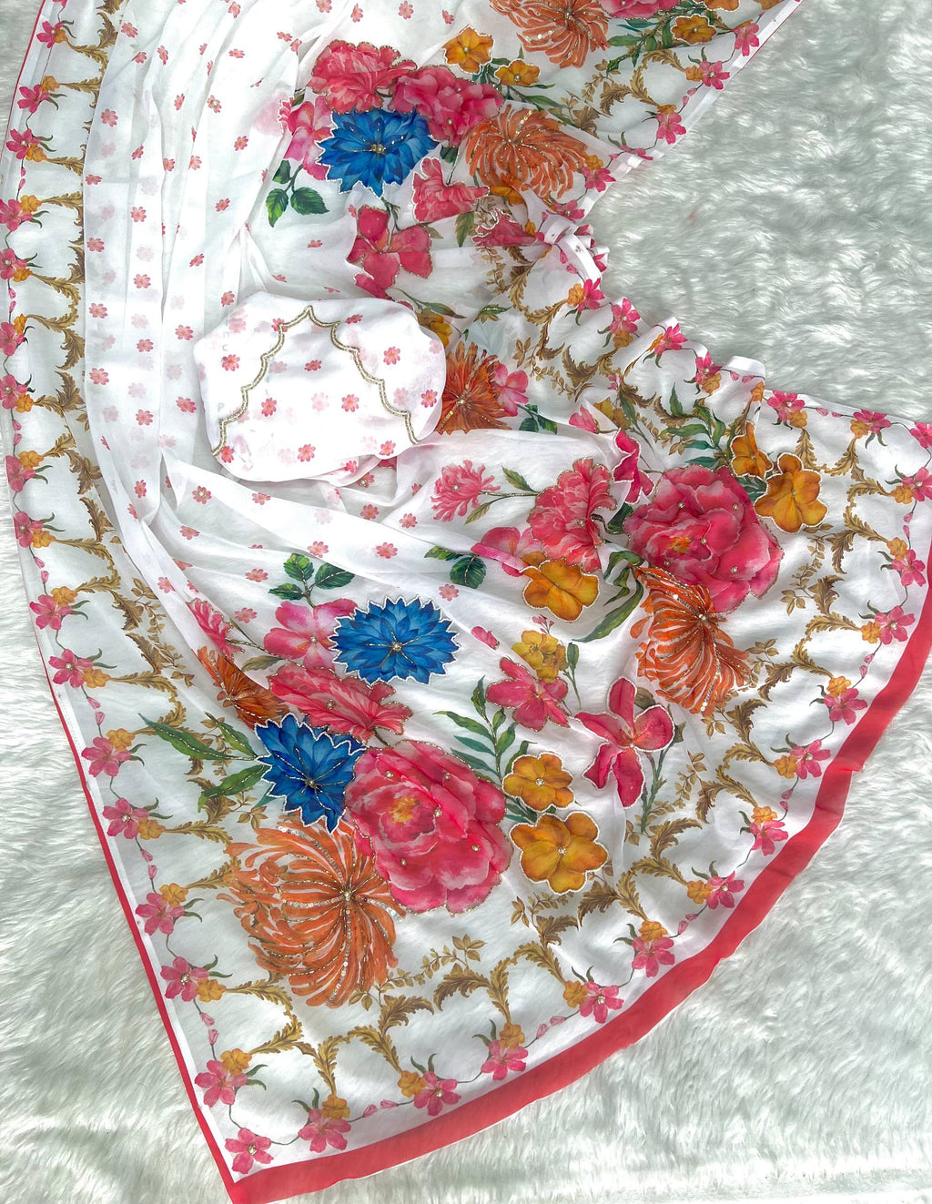 Elegant White Floral Printed Saree with Pink Border & Multicolor Flowers