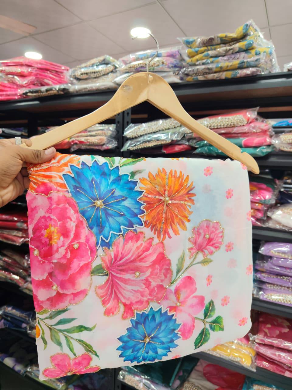 Elegant White Floral Printed Saree with Pink Border & Multicolor Flowers