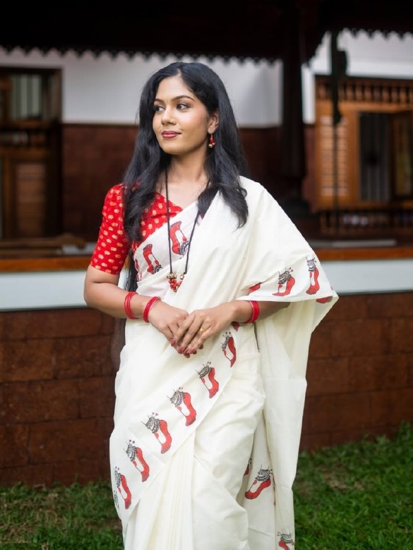 Malabar Heritage Ivory Saree with Red Geometric Border & Traditional Motif Design