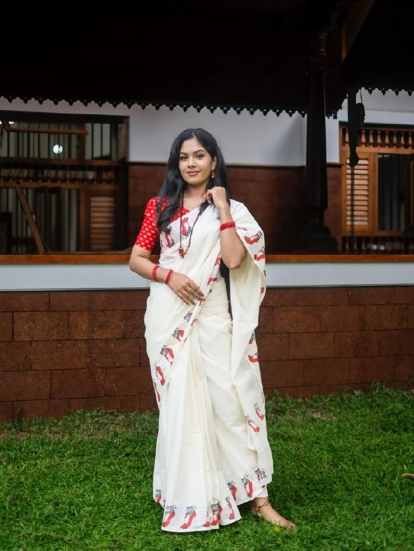 Malabar Heritage Ivory Saree with Red Geometric Border & Traditional Motif Design