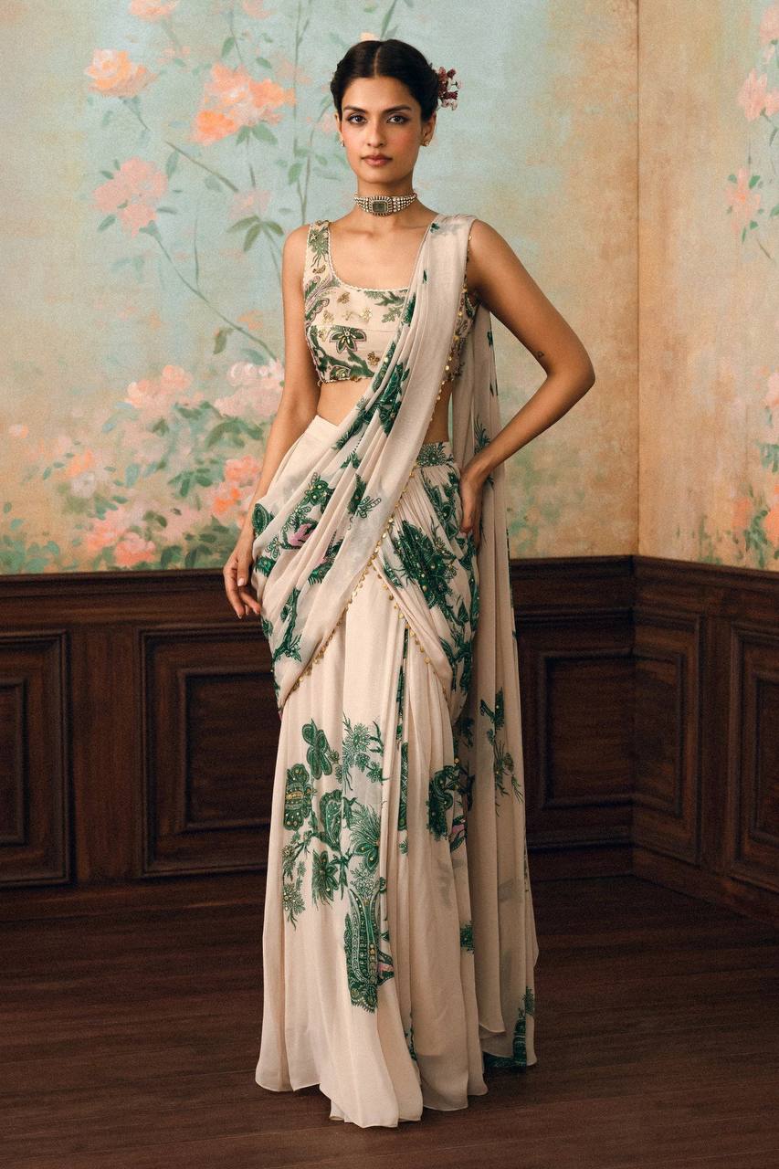 Elegant Ivory Floral Printed Saree with Green Paisley Work & Pearl Border