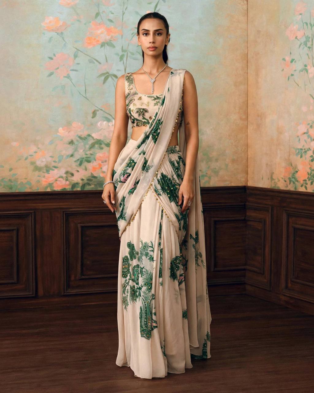 Elegant Ivory Floral Printed Saree with Green Paisley Work & Pearl Border