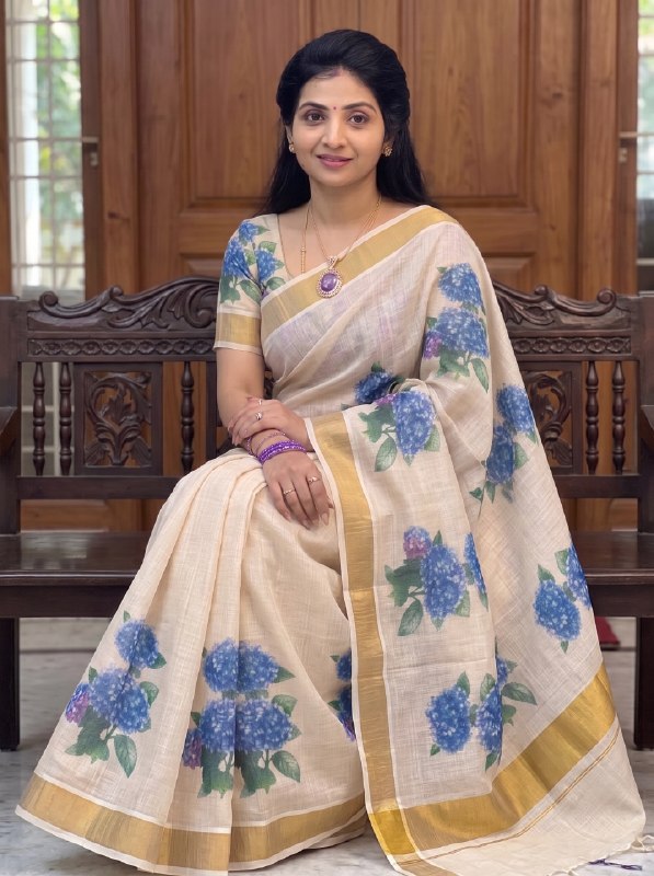 Premium Floral Linen Saree with Golden Jari Border