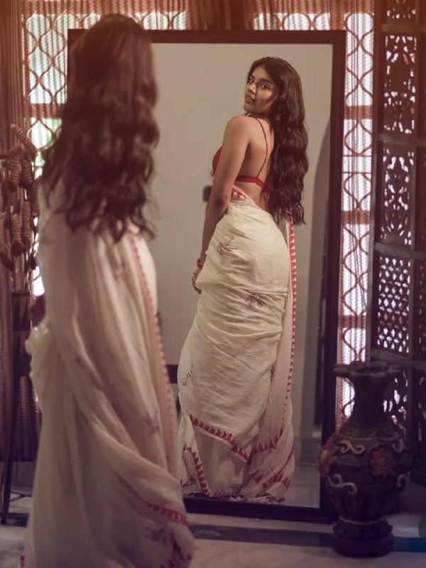 Malabar Heritage Ivory Saree with Red Geometric Border & Traditional Motif Design