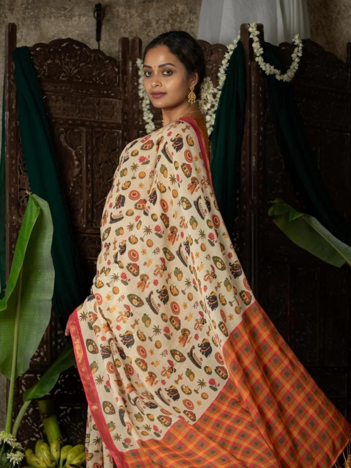 Back view of Mangalya MG690 cream folk-print saree