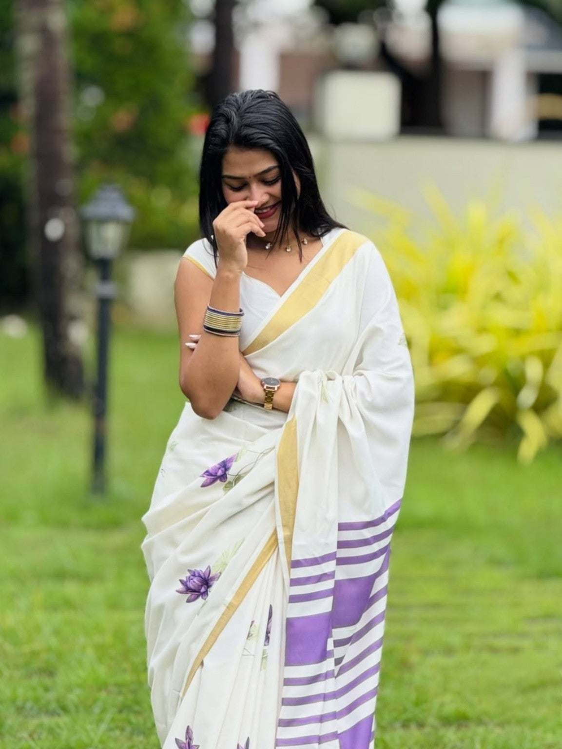 White linen saree with purple striped pallu and gold border