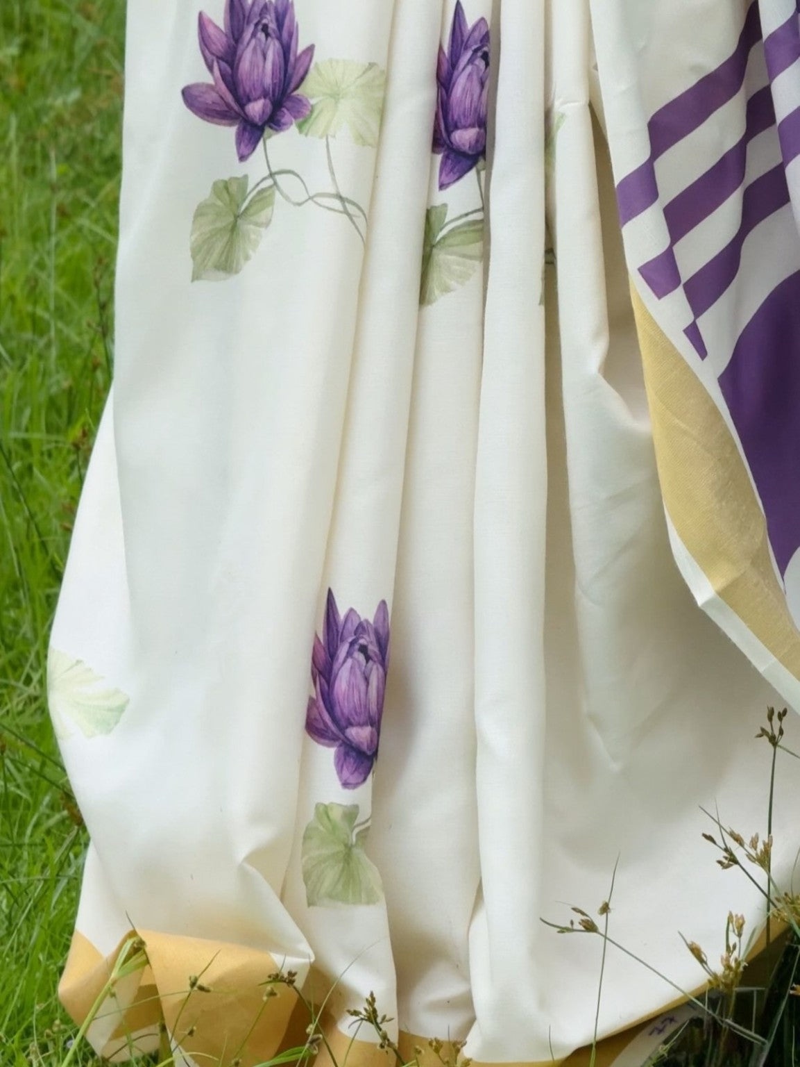 White linen saree with purple and gold border product view