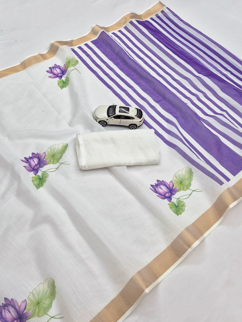 Soft white linen saree fabric with purple lotus digital print