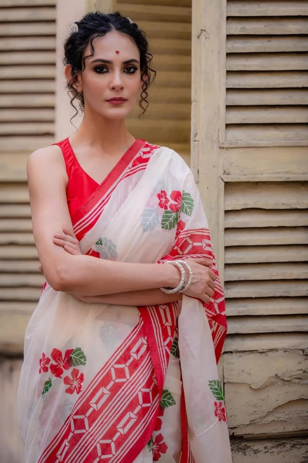 White linen saree with red floral digital print and geometric border