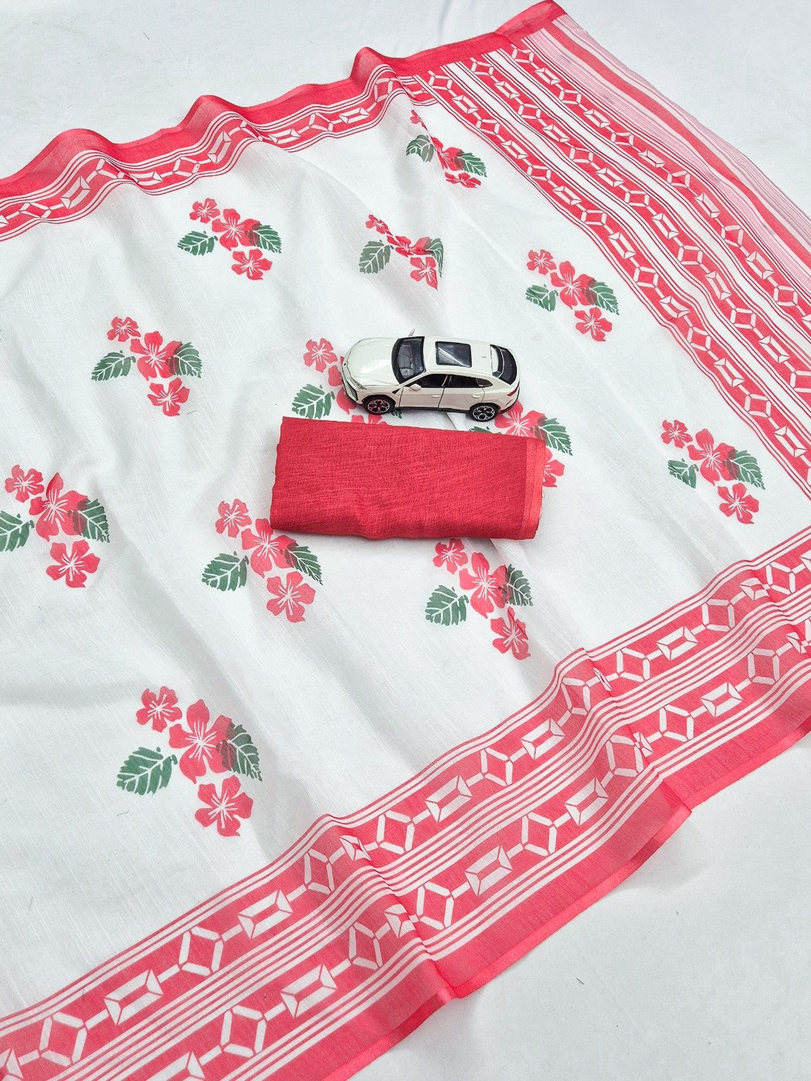 White plain linen saree with red floral digital print and matching blouse fabric