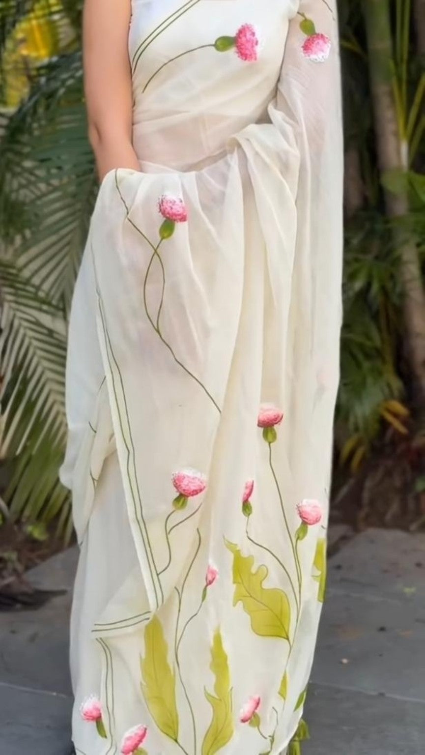 Ivory saree with pink flower and green leaf digital print close-up